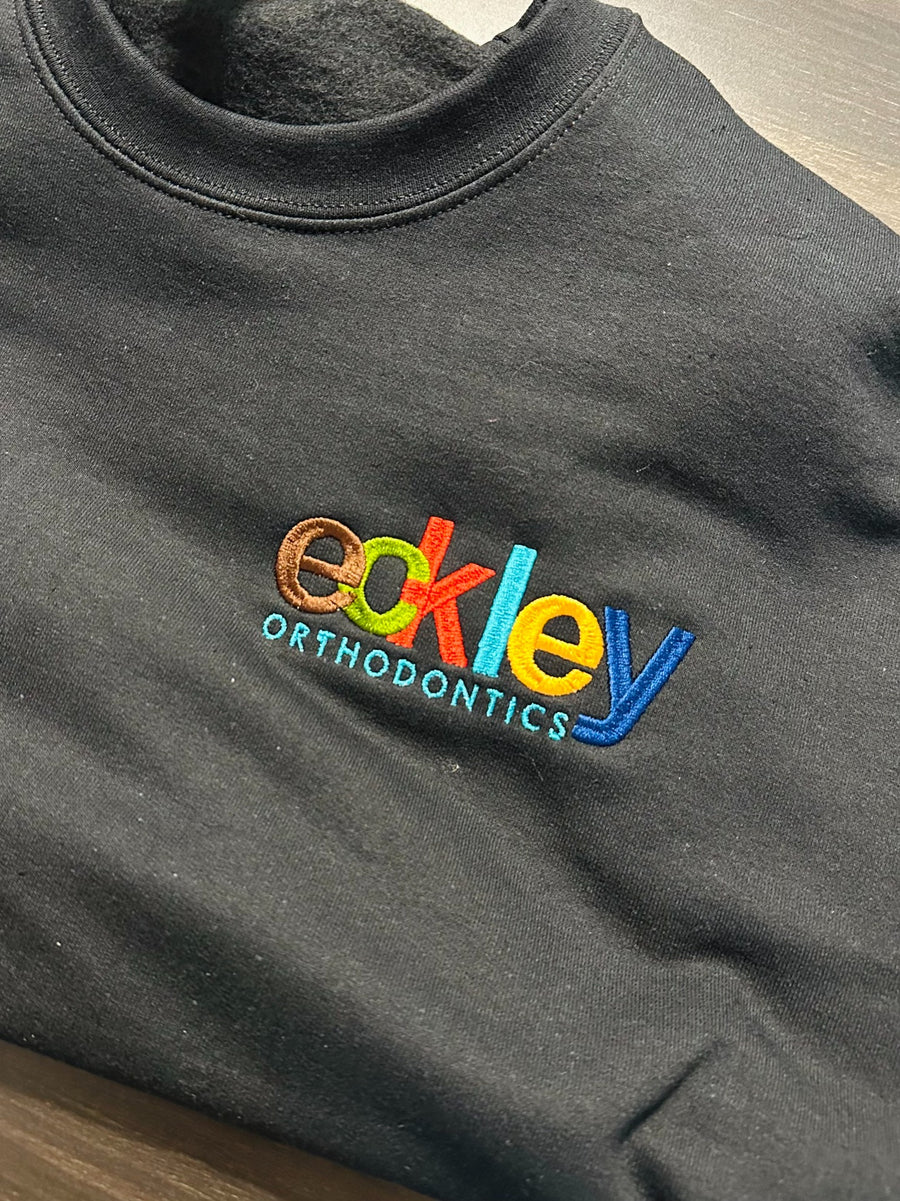 Eckley Orthodontics — Colorful logo embroidery by The Sovereign Sage.